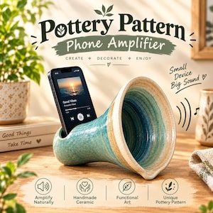 May include: A handmade ceramic phone amplifier with a flared horn shape, featuring a blue and beige swirled glaze. The device holds a black smartphone displaying a music interface. Text on the image reads Pottery Pattern Phone Amplifier.