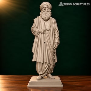 May include: A beige sculpture of a bearded man wearing a turban, a long tunic, and a dhoti, standing on a rectangular base. The figure features a beaded necklace and draped fabric details. The text TRIGO SCULPTURES is visible in the upper right corner.