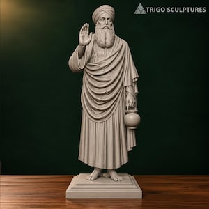 May include: A light gray sculpture of a bearded figure wearing a turban and draped robes, standing on a square base. The figure has one hand raised in a gesture and holds a small round vessel in the other. The text TRIGO SCULPTURES is visible.