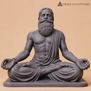 May include: A dark gray sculpture of a bearded person sitting in a cross-legged meditation pose with hands resting on knees. The figure has long hair, a full beard, and wears draped fabric over one shoulder. The text TRIGO SCULPTURES is visible.