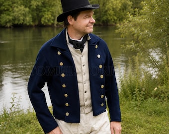 May include: A black top hat, a navy blue double-breasted jacket with gold-toned buttons, a light beige vest with matching buttons, and a black neckerchief. The ensemble includes light beige trousers, creating a historical-style outfit.