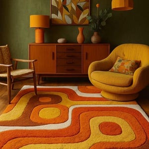 May include: A rectangular area rug featuring a thick, textured pile with a repeating pattern of wavy, organic shapes in shades of burnt orange, mustard yellow, cream, and dark brown, creating a bold, high-contrast design across the entire surface.
