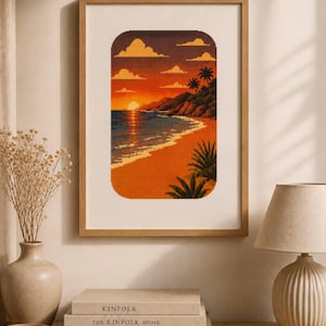 May include: A framed cross-stitch artwork featuring a pixelated sunset landscape over a beach. The scene displays a bright orange sun, dark clouds, palm trees, and a sandy shoreline with ocean waves, all contained within a rounded rectangular border.