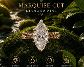 Op de afbeelding: Een 3 karaat marquise geslepen diamanten ring met een massief gouden band voorzien van ingewikkelde filigraan details. De ring is gezet in een veilige klauwzetting. De tekst op de afbeelding luidt 3 CARAT MARQUISE CUT DIAMOND RING, 3 CARAT DIAMOND, SOLID GOLD BAND, SECURE PRONG SETTING, PERFECT GIFT FOR ANY OCCASION.