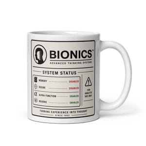 May include: A white ceramic mug featuring a black and red graphic label that reads BIONICS ADVANCED THINKING SYSTEMS. The design includes a system status list with memory and desire disabled, and alpha function and reverie enabled, plus text.