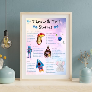 May include: A framed poster titled Throw & Tell Stories with a pastel watercolor background. It features a checklist of story prompts including illustrations of a hedgehog, robot, cake, rocket ship, and elephant with checkboxes next to text.
