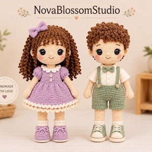 May include: Two crocheted dolls with brown yarn hair and black button eyes. The left doll wears a purple dress with a white collar and a purple bow. The right doll wears a white shirt, green shorts with suspenders, and a green bow tie.