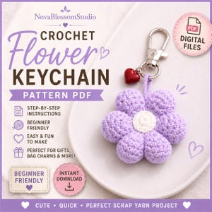 May include: A crochet flower keychain pattern PDF by NovaBlossomStudio featuring a lavender and white six-petal flower charm with a small red heart bead attached to a silver metal lobster clasp. The digital file includes step-by-step instructions.