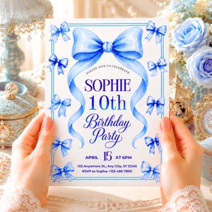 May include: A rectangular birthday party invitation card featuring a large watercolor blue bow at the top and smaller blue bows along the border. The text reads: PLEASE JOIN US CELEBRATE SOPHIE 10th Birthday Party APRIL 15 AT 6PM 123 Anywhere St., Any City, ST 12345 RSVP to Sophie +123-456-7890.