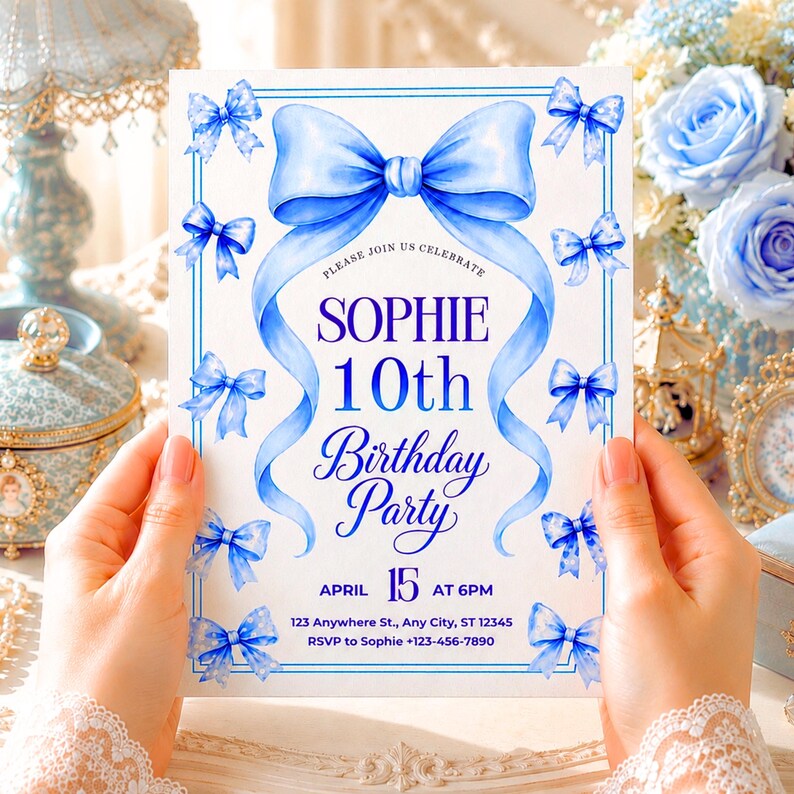 May include: A rectangular birthday party invitation card featuring a large watercolor blue bow at the top and smaller blue bows along the border. The text reads: PLEASE JOIN US CELEBRATE SOPHIE 10th Birthday Party APRIL 15 AT 6PM 123 Anywhere St., Any City, ST 12345 RSVP to Sophie +123-456-7890.