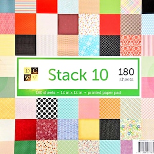 May include: A stack of patterned paper pads with a variety of designs and colors. The paper pad is labeled "Stack 10" and contains 180 sheets, each measuring 12 x 12 inches. The designs include polka dots, stripes, and floral patterns.