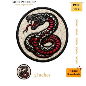 May include: A circular embroidered patch featuring a coiled snake with black and red scales, an open mouth, and a red tongue. The design is set against a textured cream background with a black border. The patch measures 7.62 cm in diameter.
