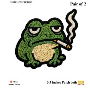 May include: An embroidered patch featuring a green frog with a beige belly, heavy-lidded eyes, and a cigarette in its mouth with a trail of white smoke rising upward. The patch is 8.89 cm in size. Text includes STITCHPATCHSHOP and Pair of 2.