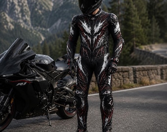 May include: A black, white and red leather motorcycle racing suit with a graphic pattern, worn with a black full-face helmet and black gloves, standing next to a black Yamaha R1 sport motorcycle on an asphalt road with mountain scenery.
