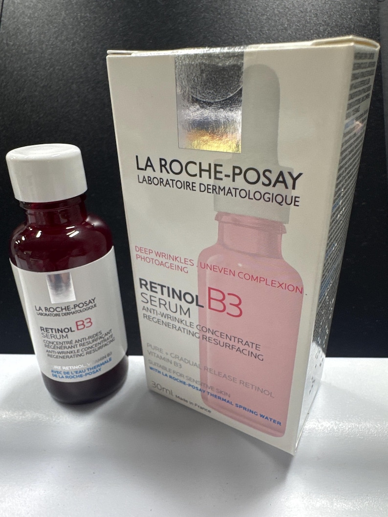 May include: A La Roche-Posay Retinol B3 serum bottle and its matching white cardboard box. The bottle is dark red with a white label. The box features the brand name, product name, and text including Deep Wrinkles, Uneven Complexion, and 30ml.