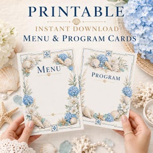 May include: Two rectangular cards labeled MENU and PROGRAM featuring a decorative border of blue hydrangea flowers, white flowers, seashells, and starfish. The cards have a white background with blue and gold accents and text.