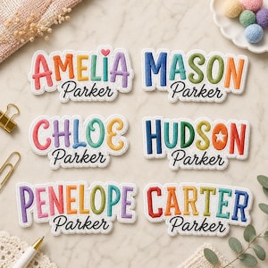 May include: Six embroidered name patches featuring colorful block letters and the cursive script name Parker below each. The names Amelia, Mason, Chloe, Hudson, Penelope, and Carter are displayed in various bright colors on a white fabric background.