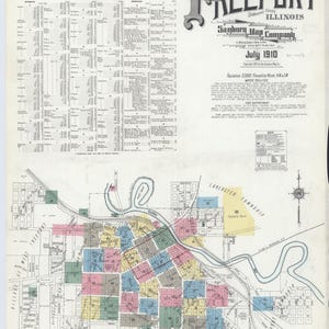 May include: A black and white Sanborn insurance map of Freeport, Illinois, dated July 1910. The document features a detailed index, a key, and a street grid with color-coded sections representing different building types and a winding river.