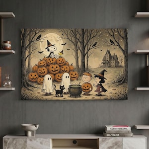May include: A rectangular wall art print featuring a Halloween scene with Snoopy and Woodstock sitting on a pile of carved pumpkins. Characters dressed as ghosts, a witch, and a pumpkin stand near a black cauldron and a black cat in a forest.