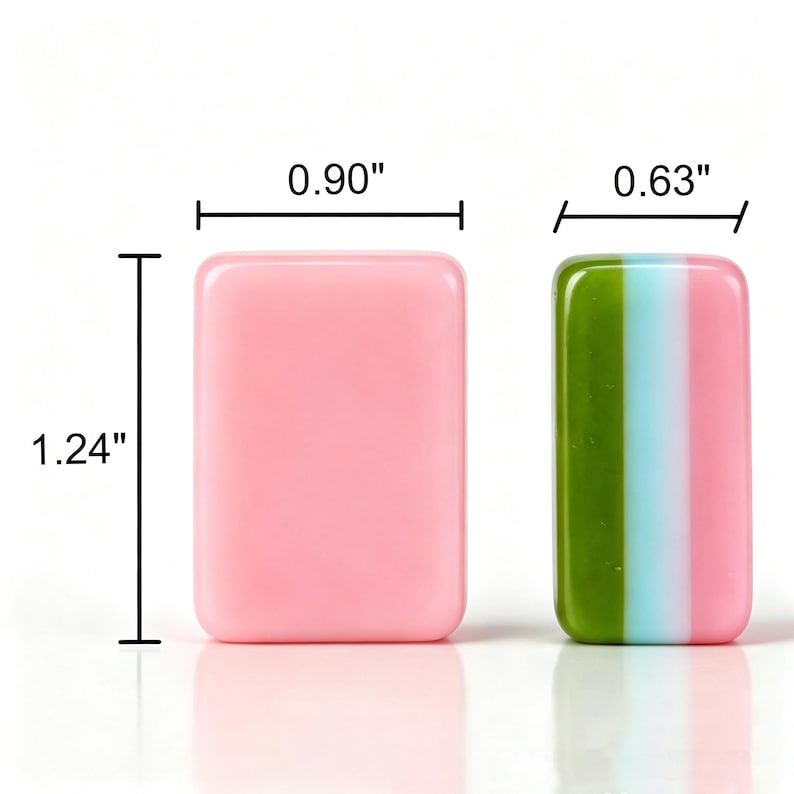 May include: Two rectangular tiles with rounded corners. The left tile is solid pink and measures 0.90 inches wide by 1.24 inches high. The right tile features vertical stripes of green, light blue, and pink, measuring 0.63 inches wide.