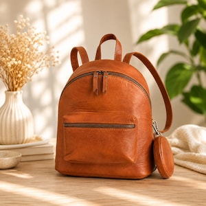 goatskin backpack mini purse Pebble Crossbody | Glam-Aholic Lifestyle | Brown | Vegan Leather | Small Convertible curb chain carry handle with lobster clasp fastening HERMES Verrou Chaine Mini Goatskin