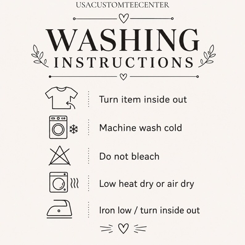 May include: A black and white graphic chart titled WASHING INSTRUCTIONS by USACUSTOMTEECENTER. It features five icons: a t-shirt, a washing machine with a snowflake, a crossed-out triangle, a dryer with heat lines, and an iron, with text for each step.