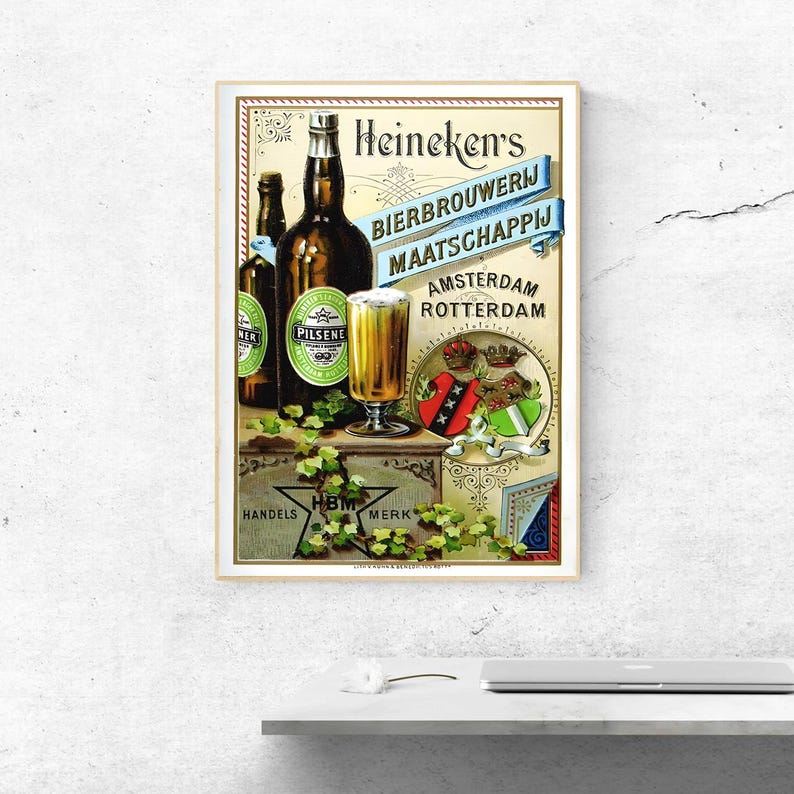May include: A vintage-style poster featuring two dark glass beer bottles and a glass of golden beer. The text reads Heineken's Bierbrouwerij Maatschappij Amsterdam Rotterdam. It includes a crest with crowns and green ivy vines on a crate.