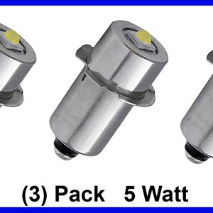 May include: Three 5 Watt LED light bulbs in a pack. The bulbs are silver with a white LED light in the center.