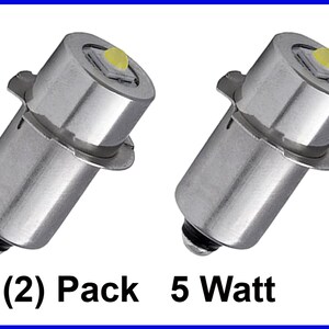 May include: Two silver 5 watt LED light bulbs with a yellow LED light in the center of each bulb. (2) Pack 5 Watt