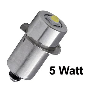 May include: A silver 5 Watt LED light bulb with a yellow light emitting diode.