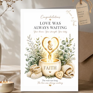 May include: A greeting card featuring the text Congratulations, LOVE WAS ALWAYS WAITING, Your dream. Your strength. Your baby., FAITH, The wait was long. The love was always waiting. It shows a baby illustration, gold heart, greenery, baby booties, and a heart-shaped wooden piece.