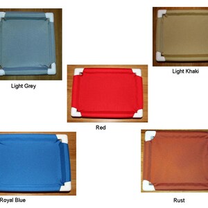 May include: Five different color options for a dog bed frame. The frame is made of white plastic and has a fabric insert. The colors are light grey, light khaki, red, royal blue, and rust.