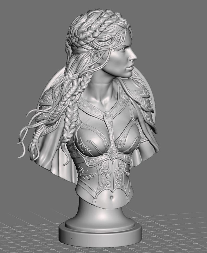 May include: A gray 3D digital model of a bust featuring a figure with braided hair and intricate armor plating on the chest and shoulders. The figure is shown from the chest up, facing to the right, with detailed scrollwork patterns on the armor.