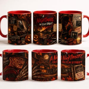 Puede incluir: Una taza de cerámica con gráficos de A Nightmare on Elm Street, que incluyen una casa, una señal de calle, hojas de otoño y Freddy Krueger con su guante de cuchillas. El texto dice A Nightmare on Elm Street, Sweet Dreams y Never Sleep Again.