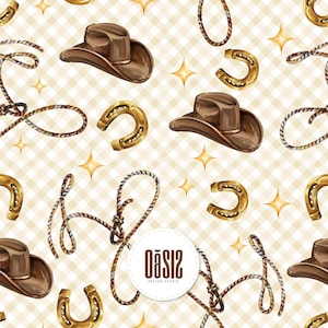 May include: A repeating pattern featuring brown cowboy hats, golden horseshoes, and coiled ropes on a light beige checkered background with small four-pointed stars. A circular white label in the center displays the text Oasis Design Studio.