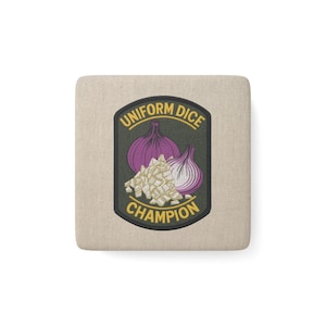 May include: A square beige coaster featuring a dark green shield-shaped emblem. The emblem displays two purple onions and a pile of diced white onion pieces. The yellow text reads UNIFORM DICE at the top and CHAMPION at the bottom.