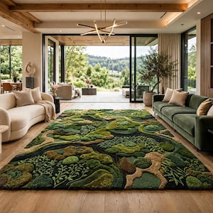 May include: A rectangular area rug featuring a textured, three-dimensional landscape design in shades of forest green, olive, moss, and tan. The rug displays abstract organic shapes, foliage patterns, and raised tufted sections on a dark base.