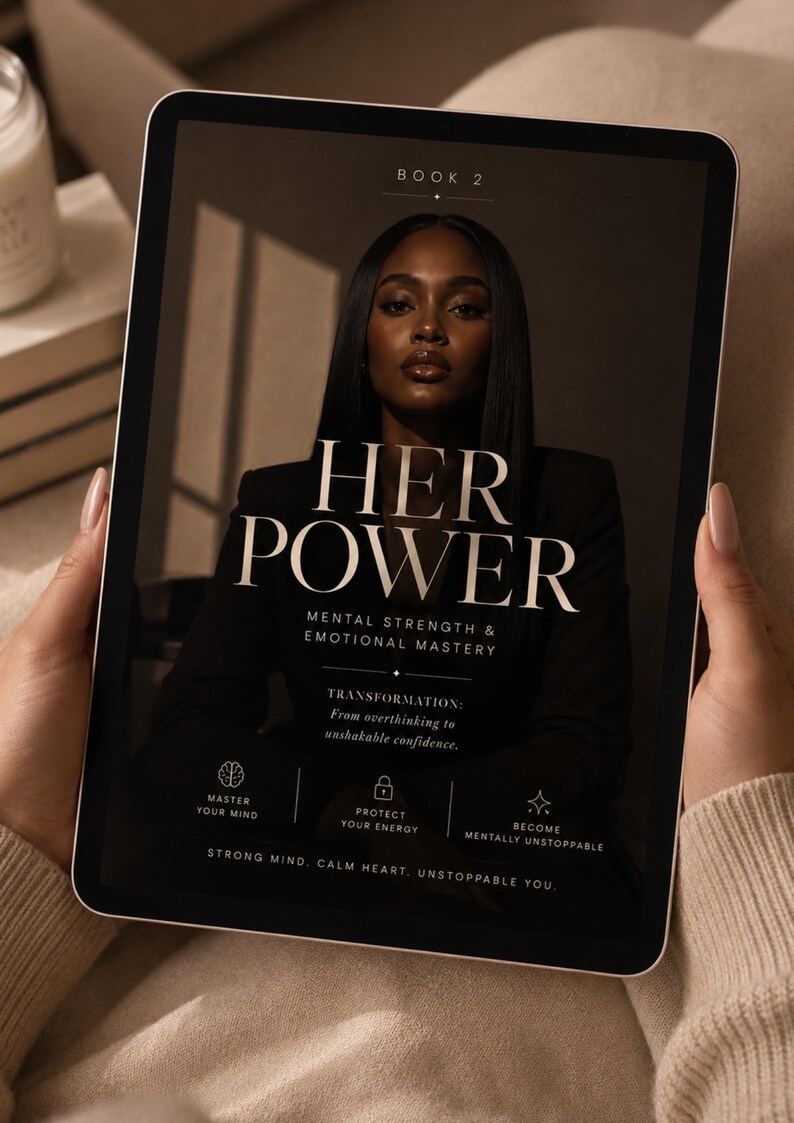 May include: A digital tablet displaying a book cover titled HER POWER: MENTAL STRENGTH & EMOTIONAL MASTERY. The cover features a portrait of a person in a black blazer, with text including BOOK 2, TRANSFORMATION: From overthinking to unshakable confidence, and icons for MASTER YOUR MIND, PROTECT YOUR ENERGY, and BECOME MENTALLY UNSTOPPABLE.