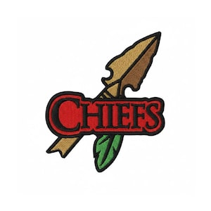 May include: An embroidered patch featuring a tan arrowhead and a green feather positioned behind a red banner with a black border. The word CHIEFS is stitched in red capital letters across the centre of the banner with a thick black outline.