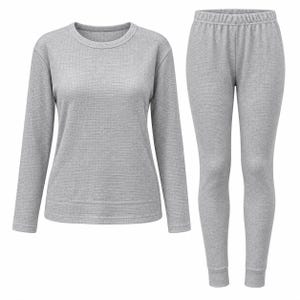 May include: A light grey long-sleeve shirt and matching leggings set featuring a textured waffle-knit fabric. The shirt has a round neckline and long sleeves, while the leggings feature an elasticated waistband and fitted cuffs at the ankles.