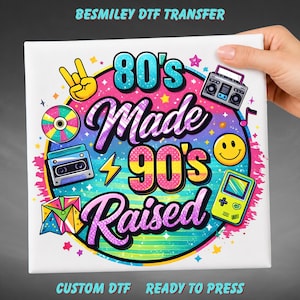 May include: A square DTF transfer sheet featuring the text 80's Made 90's Raised in a bold, colorful font. The design includes retro graphics like a boombox, cassette tape, smiley face, handheld game console, CD, and a hand making a rock sign.