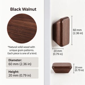 May include: A dark brown black walnut wood hook with a rounded rectangular shape. The hook measures 2.36 inches in height and 0.79 inches in width and depth. The text Black Walnut is visible along with dimensions in inches and millimeters.