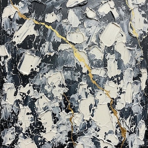 May include: A rectangular canvas painting featuring a heavily textured impasto application of black, gray, and off-white paint. A single, jagged, thin line of metallic gold paint runs diagonally across the surface, creating a stark contrast.