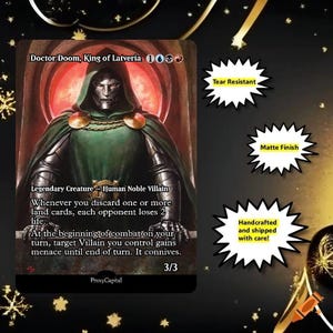 May include: A Doctor Doom, King of Latveria trading card featuring a metallic-masked figure in a green cloak against a red circular backdrop. Text bubbles on the right side state: Tear Resistant, Matte Finish, and Handcrafted and shipped with care!