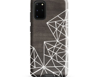 May include: A black phone case with a white geometric design. The case has a wood grain texture.