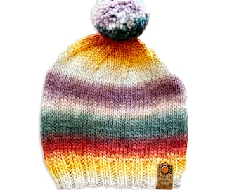 hand knit hat with pom-pom