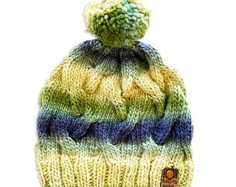 handgebreide hoed met pom-pom