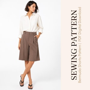 May include: A sewing pattern for Bermuda shorts, available as a PDF digital download. The garment features high-waisted, knee-length brown shorts with front pleats, paired with a long-sleeved, button-down cream-colored shirt.