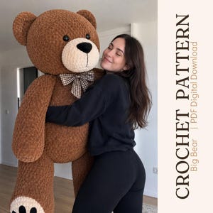 May include: A large brown plush teddy bear with a cream-colored muzzle, black eyes, and a brown and white checkered bow tie. The text on the right side reads CROCHET PATTERN | PDF Digital Download | Big Bear.