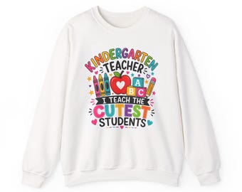 Moletom de gola redonda unissex Heavy Blend™ para professora de jardim de infância. Eu ensino os alunos mais fofos. Moletom para professora.